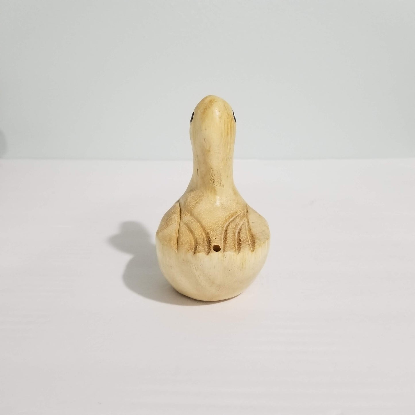 Wooden whistle duck