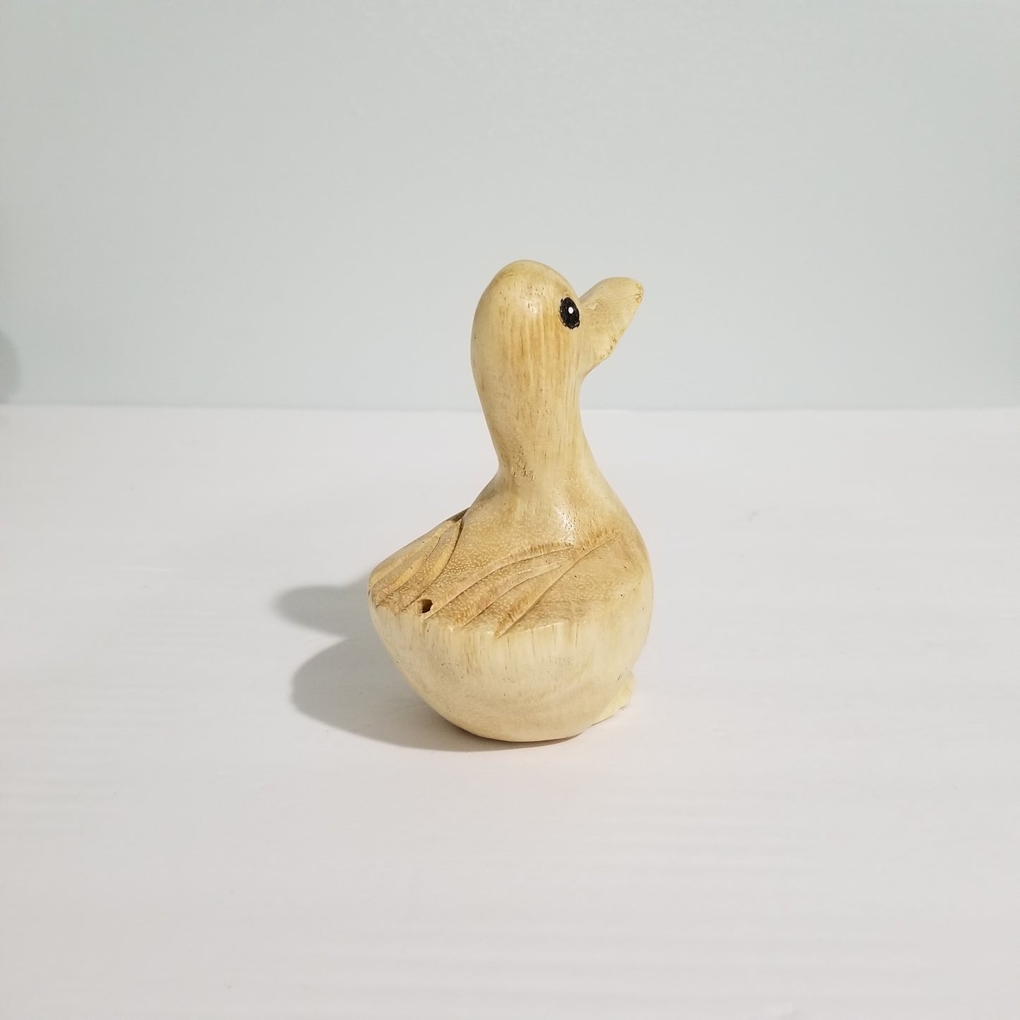 Wooden whistle duck