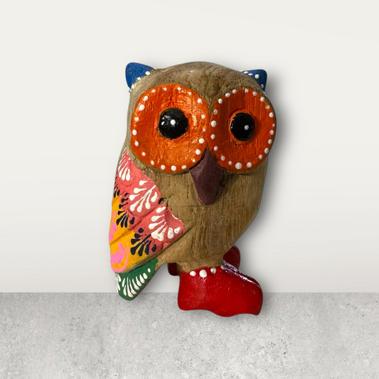 Red-Boot Owl with Blue Ears
