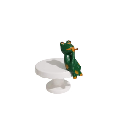 Relaxing frog figurine
