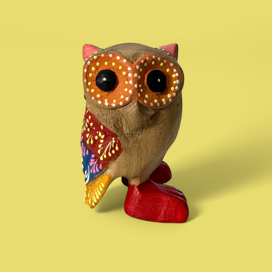 Yellow-Spotted Owl with Red Boots
